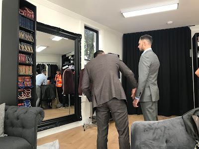 The Bespoke Corner tailor shop taking mesures